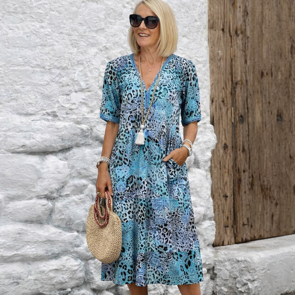 Cempoala™ Vestido Midi con Estampado Animal, Bolsillos y Manga Corta